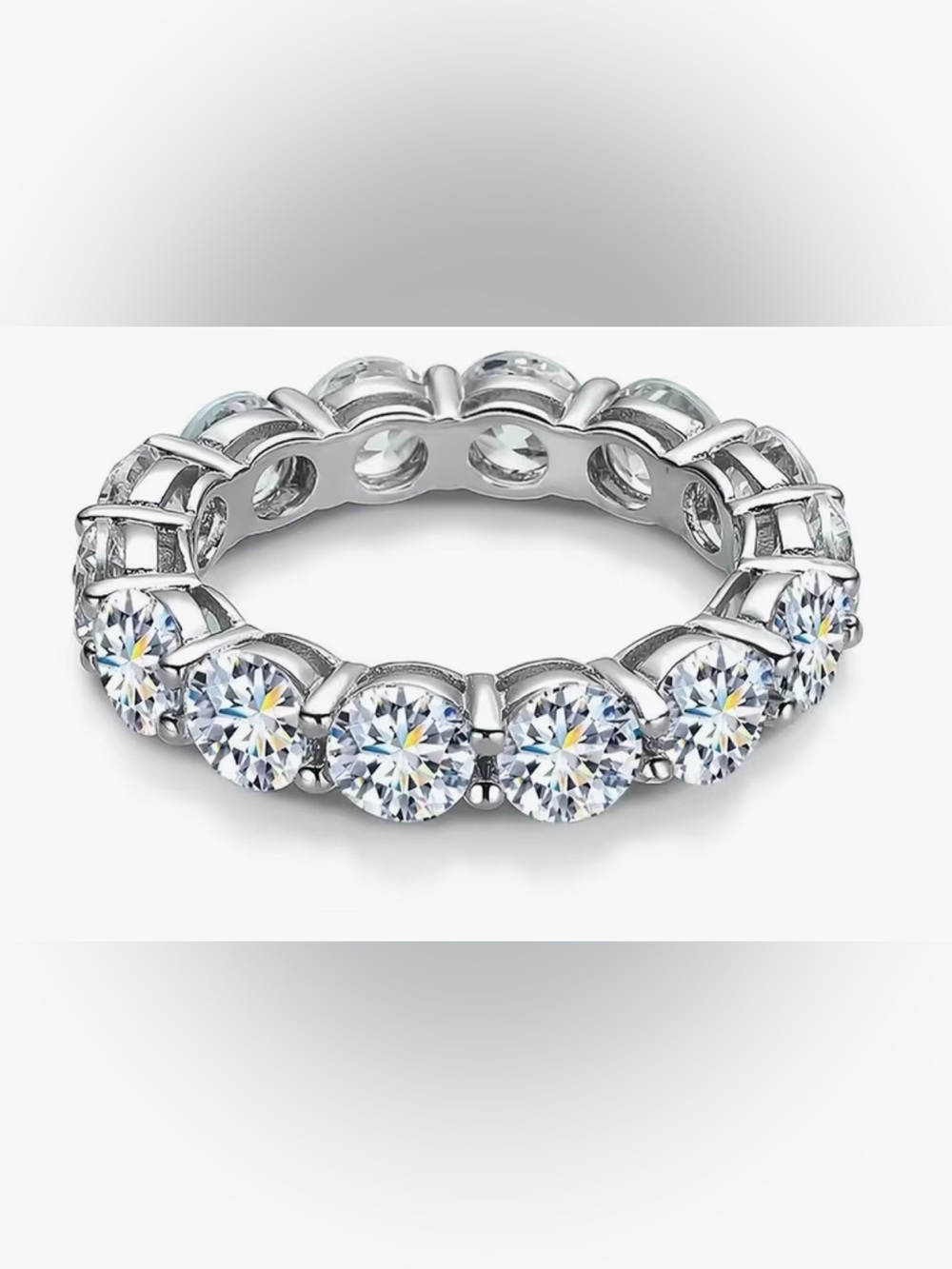 Silver-Tone Eternity Cubic Zirconia Ring - Clear. Size 5. Brand new/never worn.